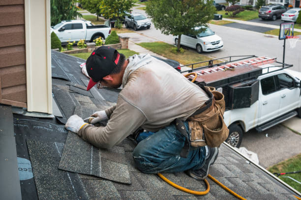 Professional Roofing technician working in Victor, CA